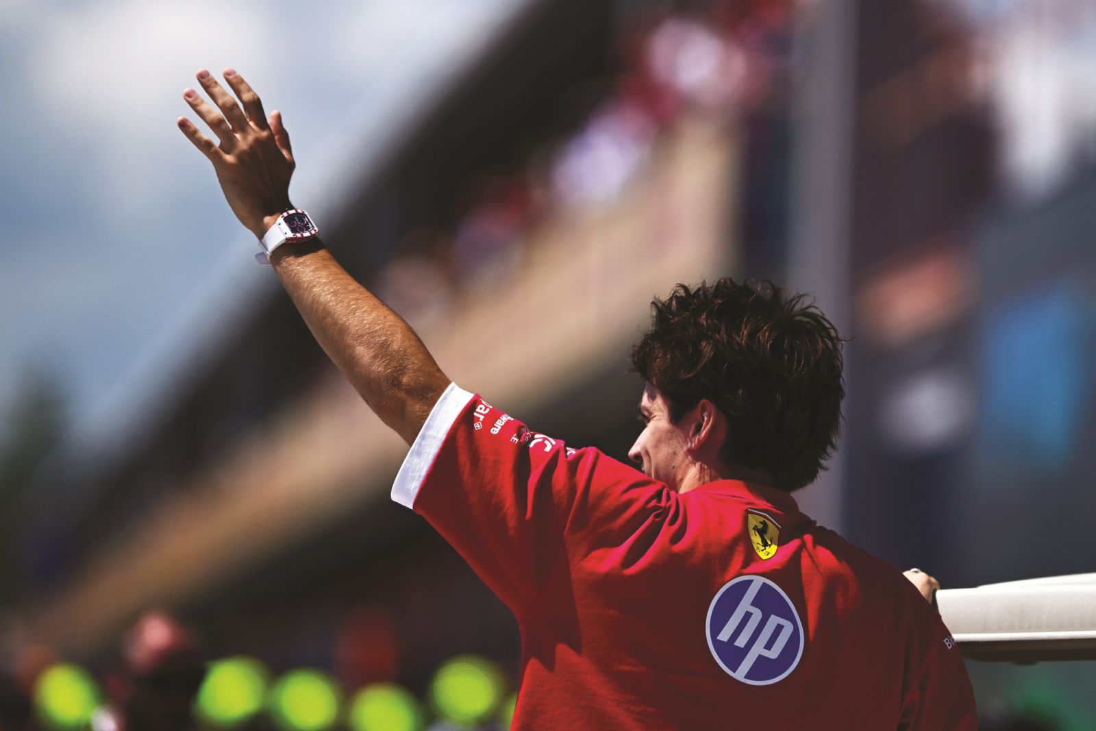 IMOLA, ITALY - MAY 18: Charles Leclerc of Monaco and Scuderia Ferrari waves to fans during the F1 Grand Prix of Emilia-Romagna at Autodromo Internazionale Enzo e Dino Ferrari on May 18, 2025 in Imola, Italy. (Photo by Mario Renzi - Formula 1/Formula 1 via Getty Images)