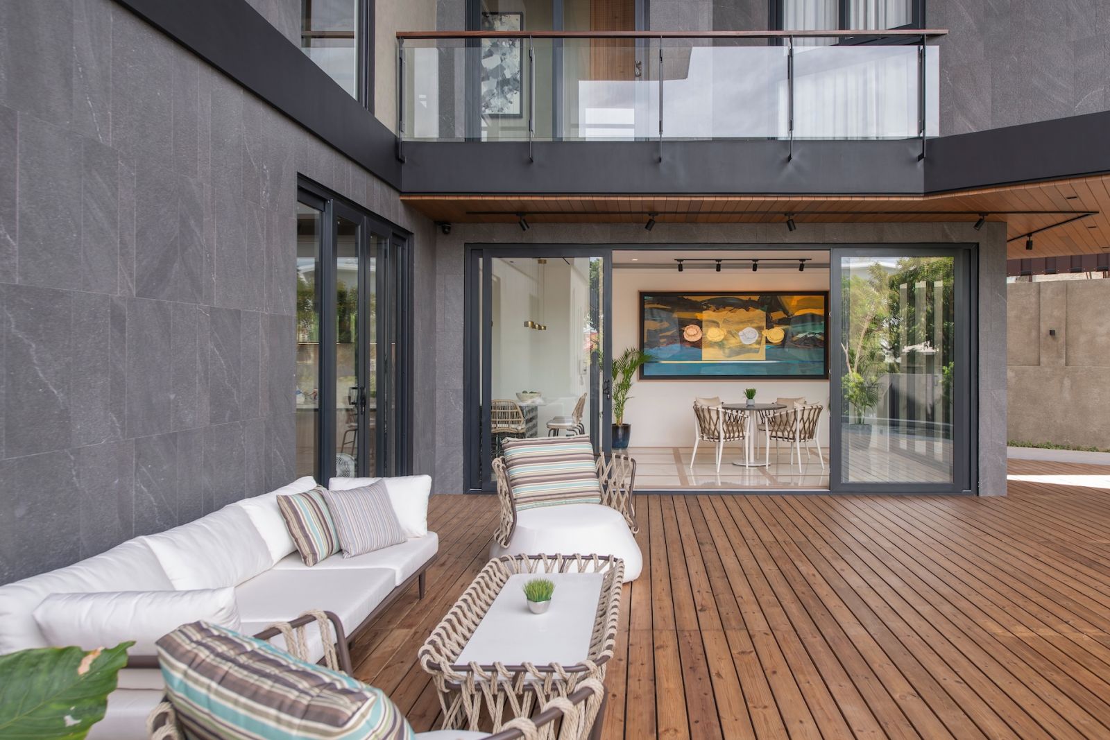 The outdoor seating area of this Alabang, Metro Manila home designed by Rock Robins