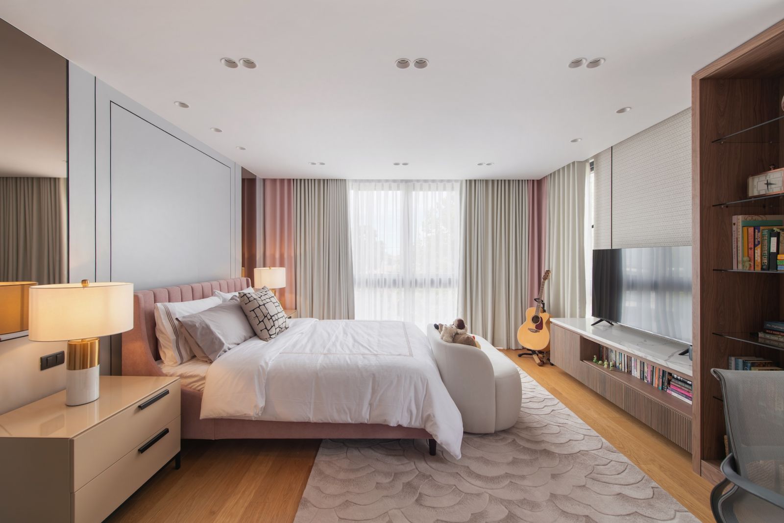 One of the bedrooms in this Alabang, Metro Manila home designed by Rock Robins