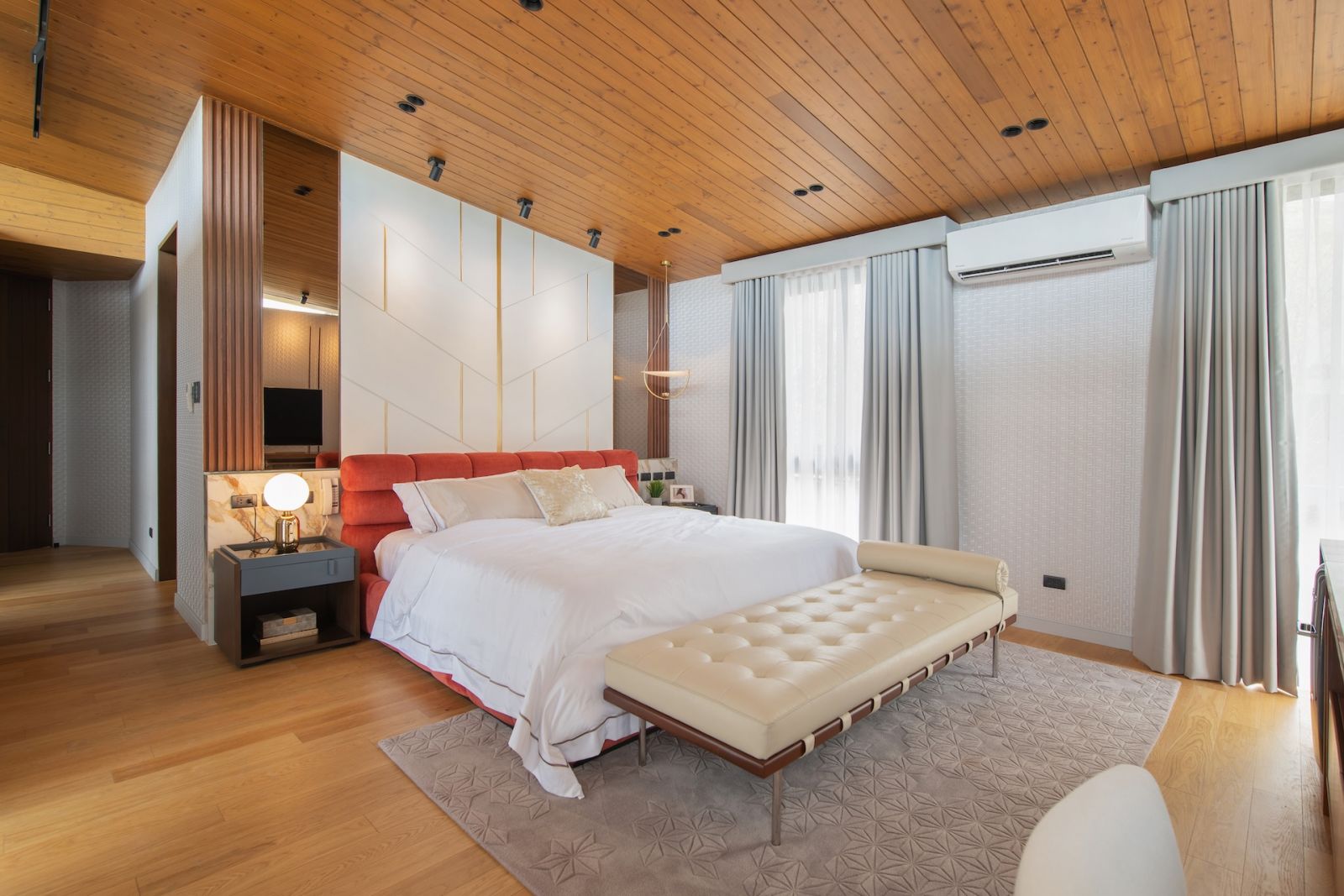 One of the bedrooms in this Alabang, Metro Manila home designed by Rock Robins