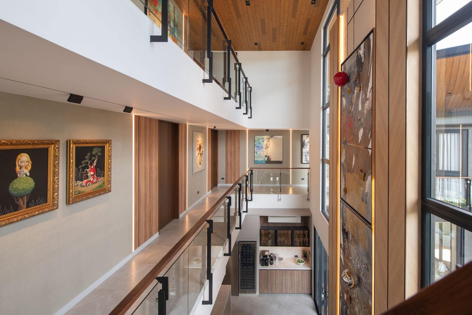 Exploring the expansive collection of art on three floors of this Alabang, Metro Manila home designed by Rock Robins