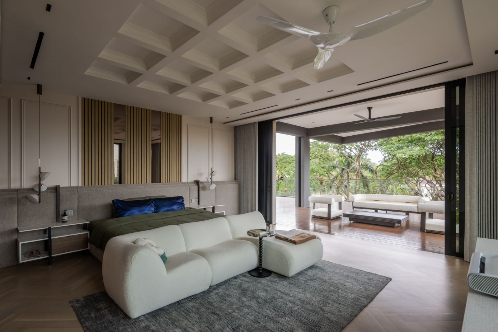 The master bedroom opens up to the greenery