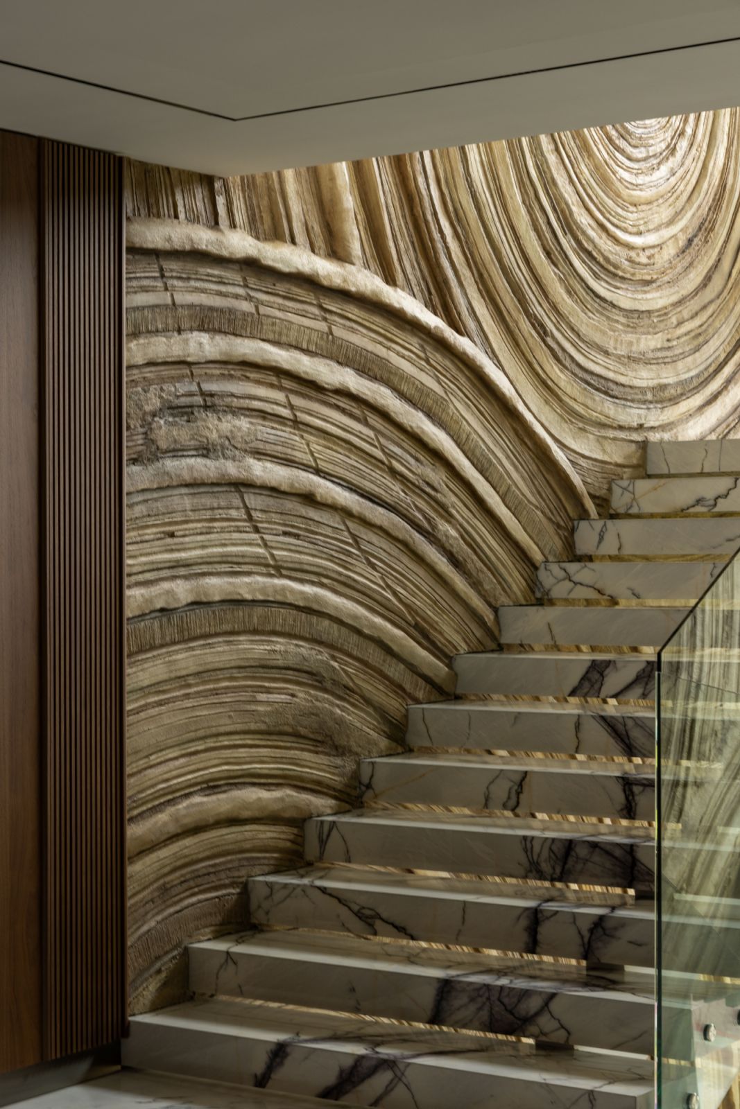 The mesmerising marble staircase appears as one uninterrupted block of material when viewed from above