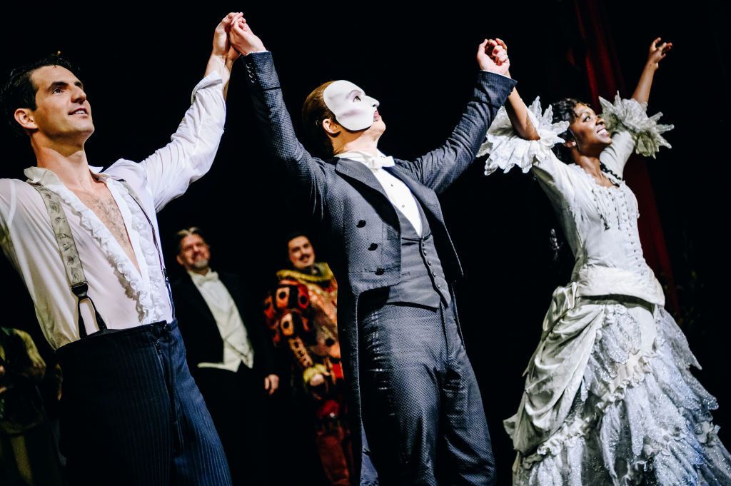 "Phantom Of The Opera" Closing Night On Broadway
NEW YORK, NEW YORK - APRIL 16: (L-R) John Riddle, Laird Mackintosh and Emilie Kouatchou during the closing night of the long running musical "Andrew Lloyd Webber's The Phantom of The Opera" on Broadway at The Majestic Theatre on April 16, 2023 in New York City. After 35 years on Broadway, “The Phantom of the Opera” will close its doors at the Majestic Theatre on Broadway on April 16 (Photo by Bruce Glikas/Getty Images)