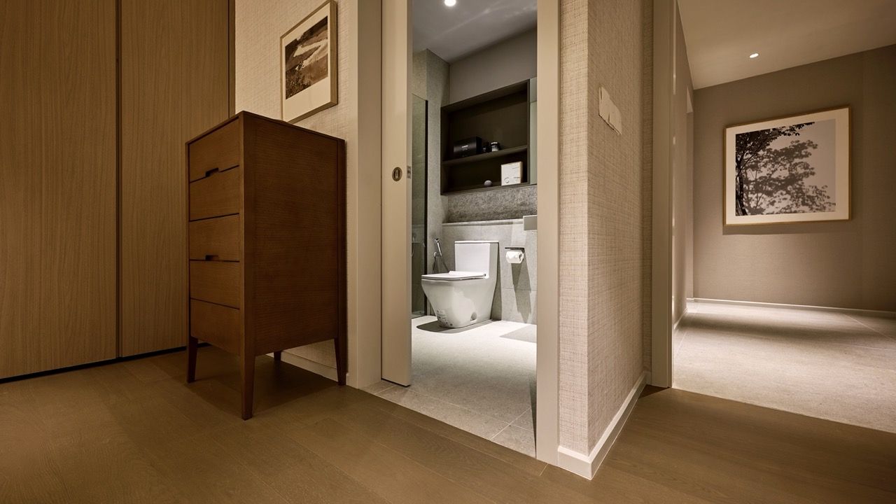Mobility-friendly design in Bathroom 3 showing flush flooring transitions, part of the mobility-friendly design with wide corridors throughout the unit