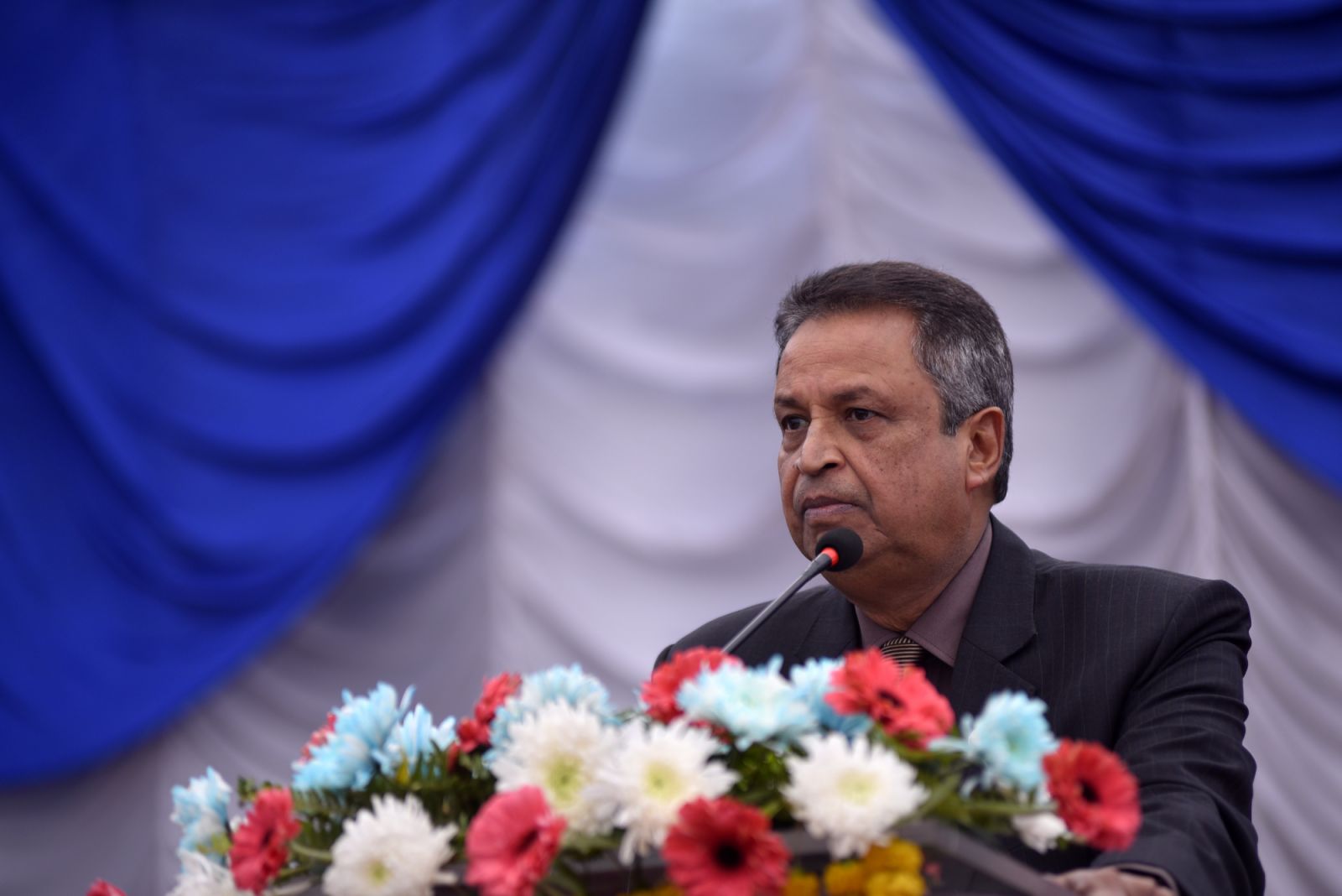 Chairman of Chaudhary Foundation Binod Chuadhary giving speech during Artificial limb fitment camp in Norvic International Hospital, Kathmandu, Nepal on Sunday, January 13, 2019. The Bhagwan Mahavir Vikalang Sahayata Samiti (BMVSS) making an artificial limb camp for amputees with disability in association with Chaudhary Foundation, a charity organisation belonging to Binod Chaudhary, the first billionaire of Nepal. 500 hundred disabled people in Nepal will be provided free prosthesis 'Jaipur Foot' during an