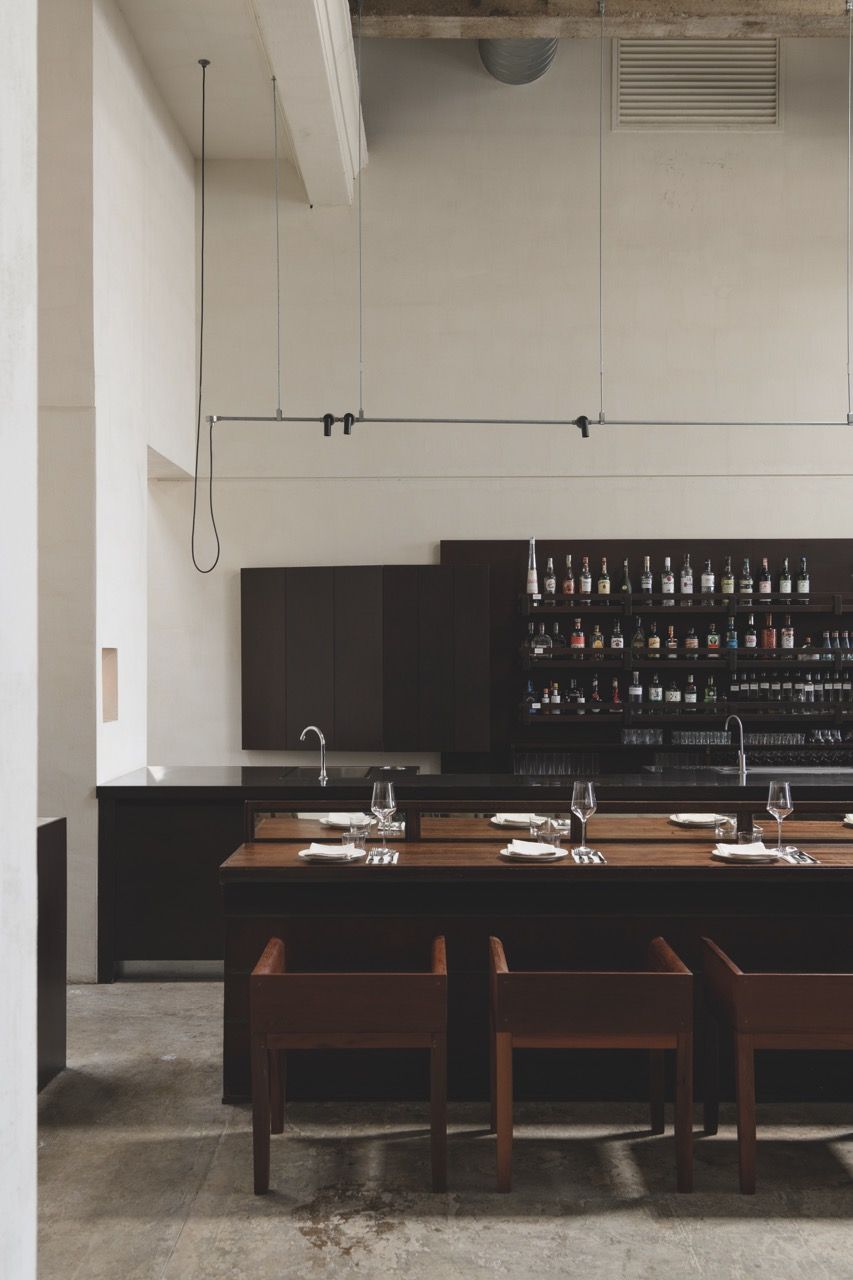 A repurposed jewellery desk finds new life as Peninsula House’s bar beneath the loft-like ceiling space (Photo: TWJPTO)