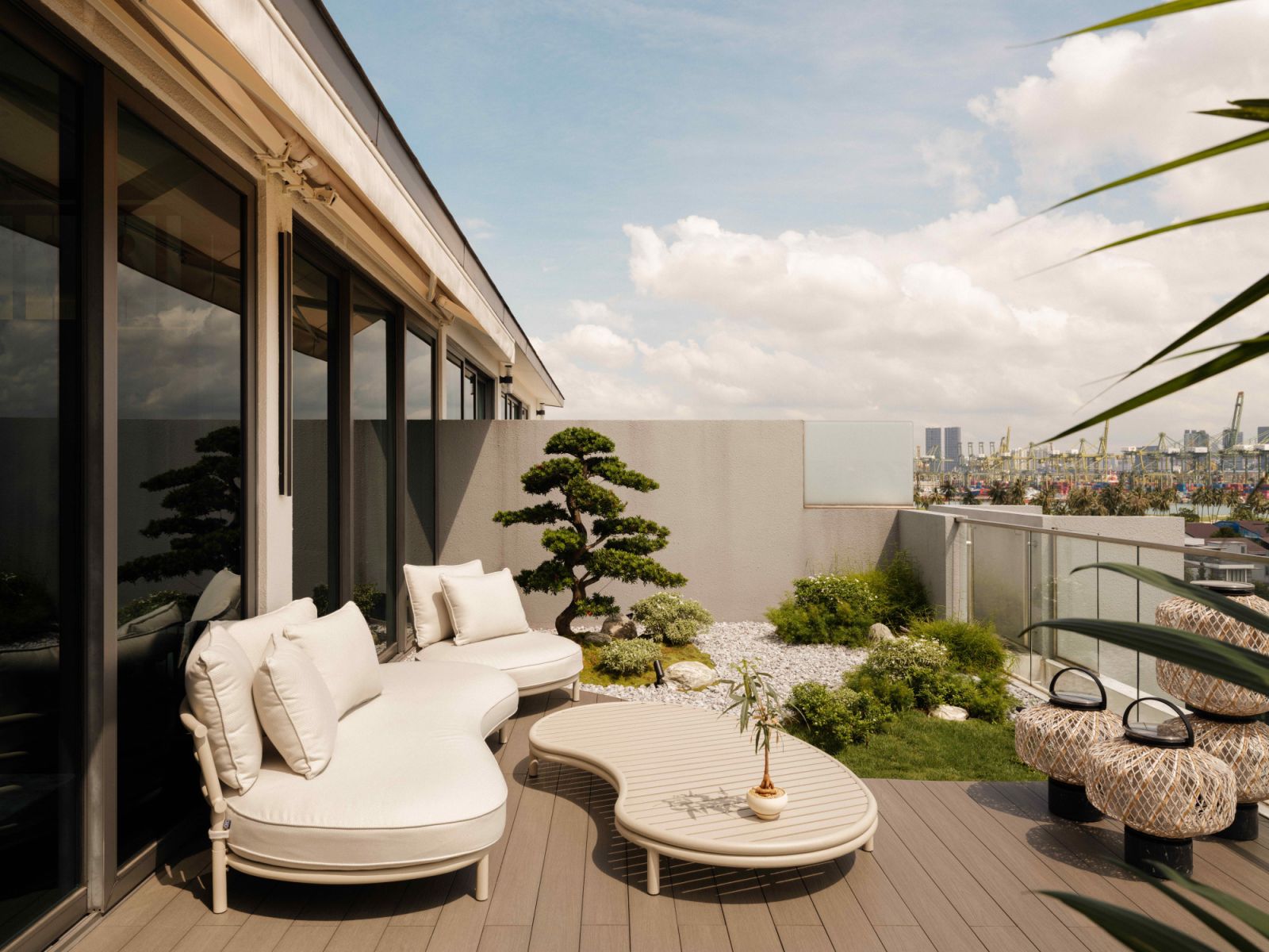 The outdoor terrace features a garden by Soilboy, its sinuous lines perfectly paired with the Eichholtz Laguno sofa and coffee table from Prelude Living