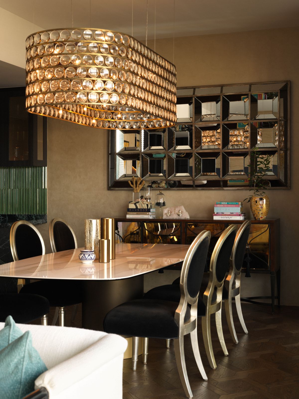 A Viabizzuno Da Ma suspension light by David Chipperfield and Mario Nani takes pride of place in the dining room