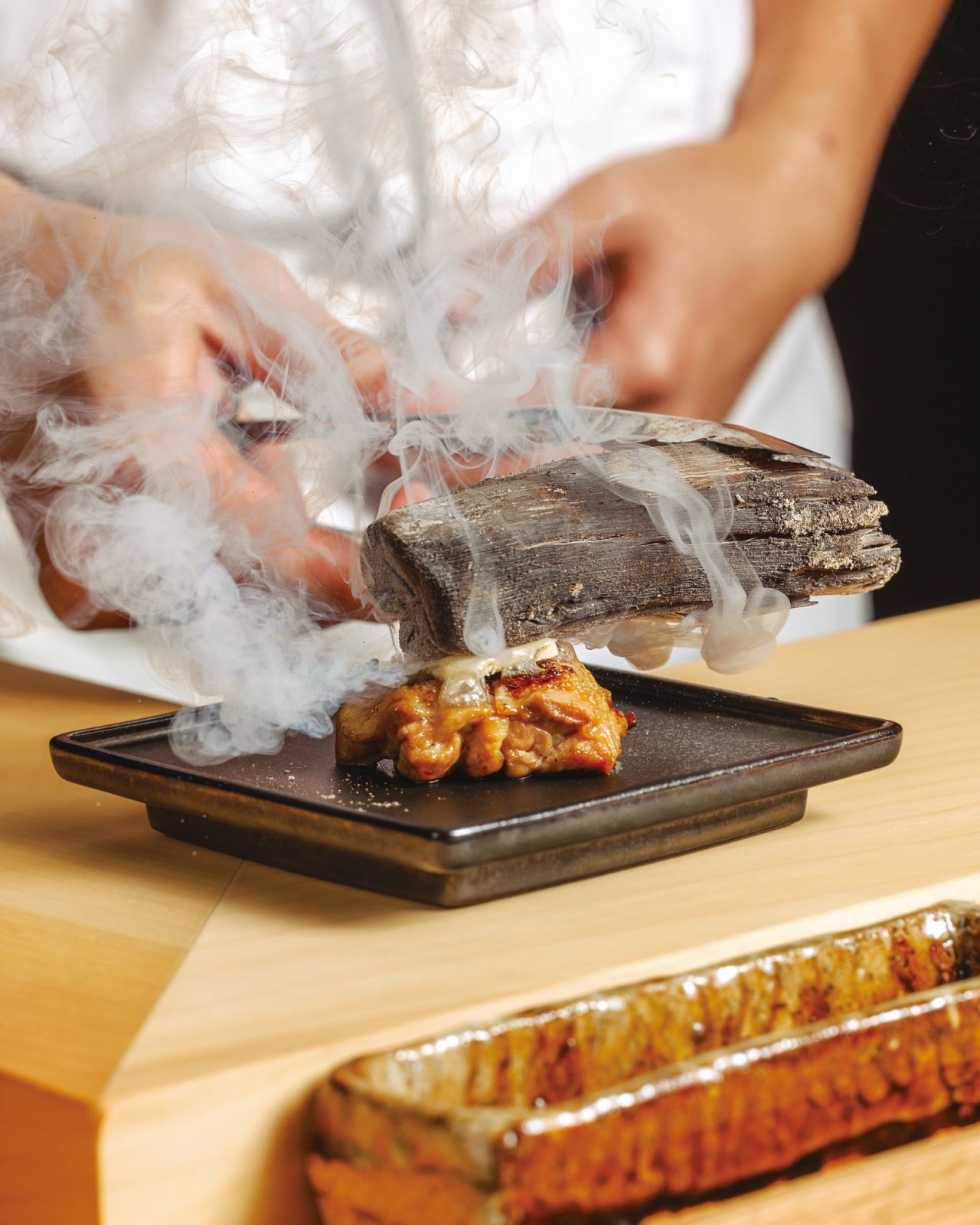 Signature charred chicken crowned with Echire butter and seared with charcoal (Photo: Torikami) tanjong pagar food guide