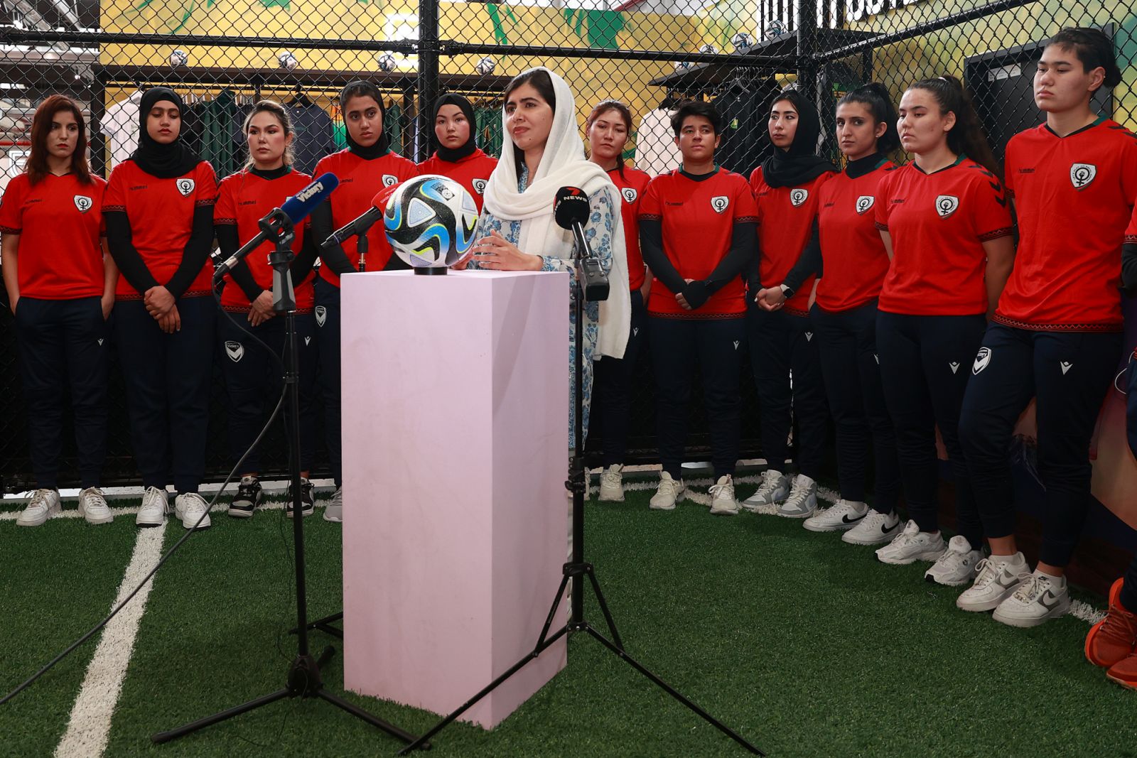 Malala and the Afghan women's soccer team (Photo: Getty Images)