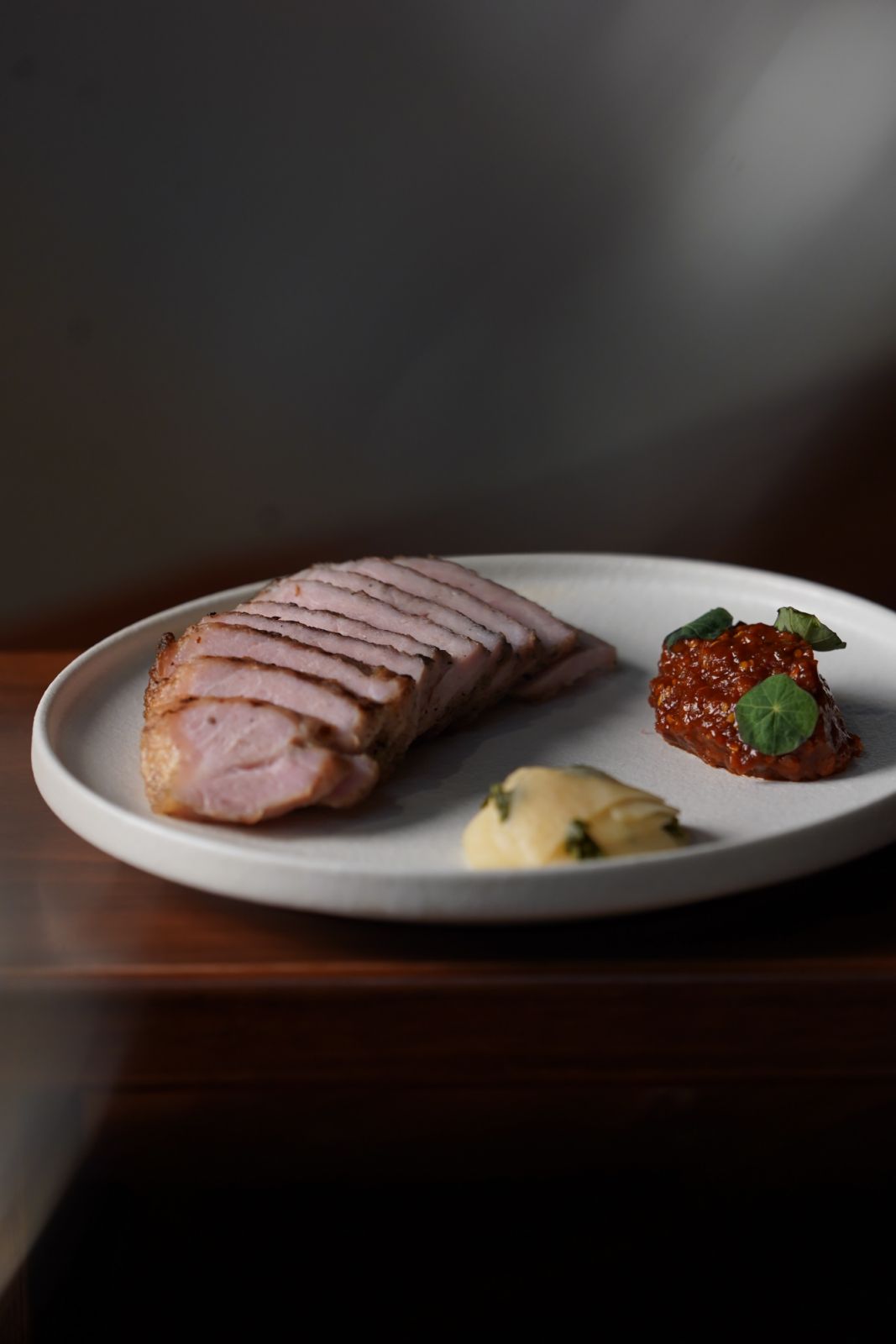 Grilled fatty Iberico pork paired with a rich and spicy barley ssamjang (Photo: Anju) tanjong pagar food guide