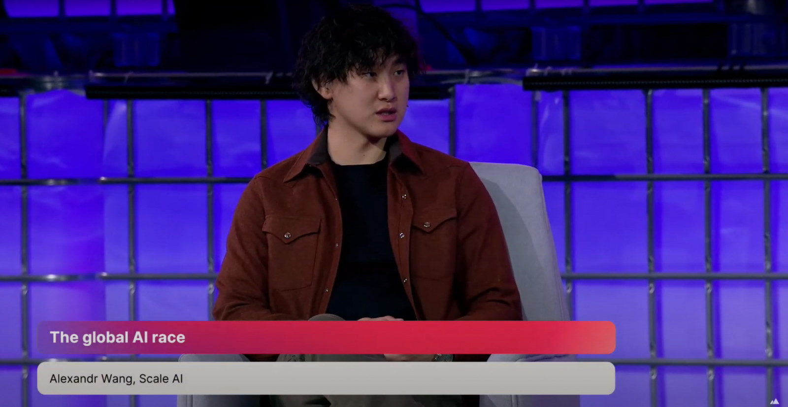 Scale AI's CEO and co-founder Alexandr Wang discussing artificial intelligence at the Web Summit 2025 in Qatar (Photo: Web Summit Youtube channel)