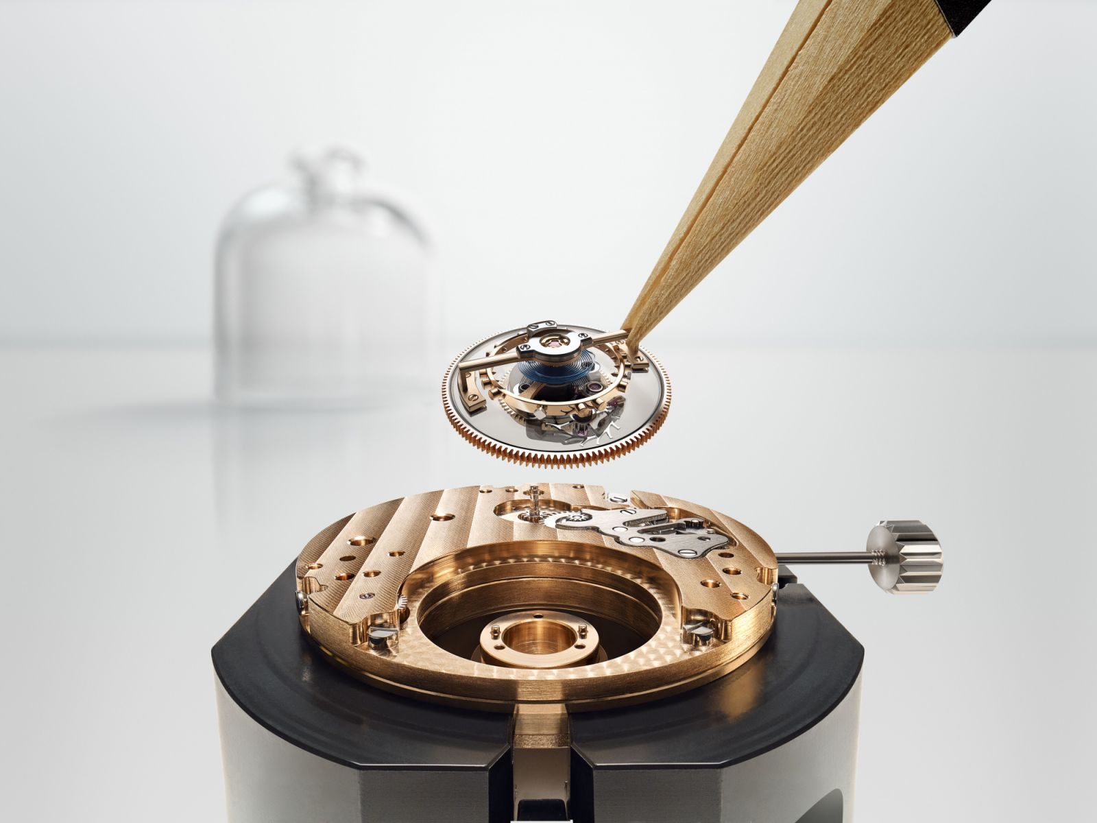 The tourbillon is encased in a flying cage, which makes it appear as if it is floating