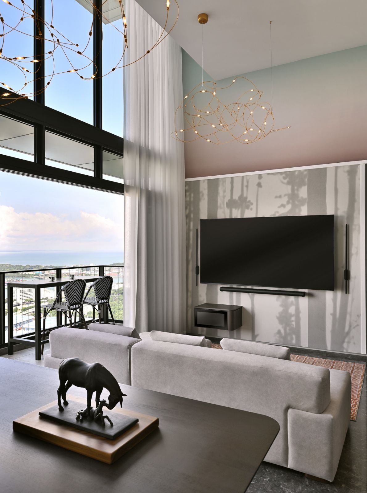With panoramic views of Sentosa Island and the city skyline, this stunning 56th-floor penthouse is both a family sanctuary and an entertainer’s dream