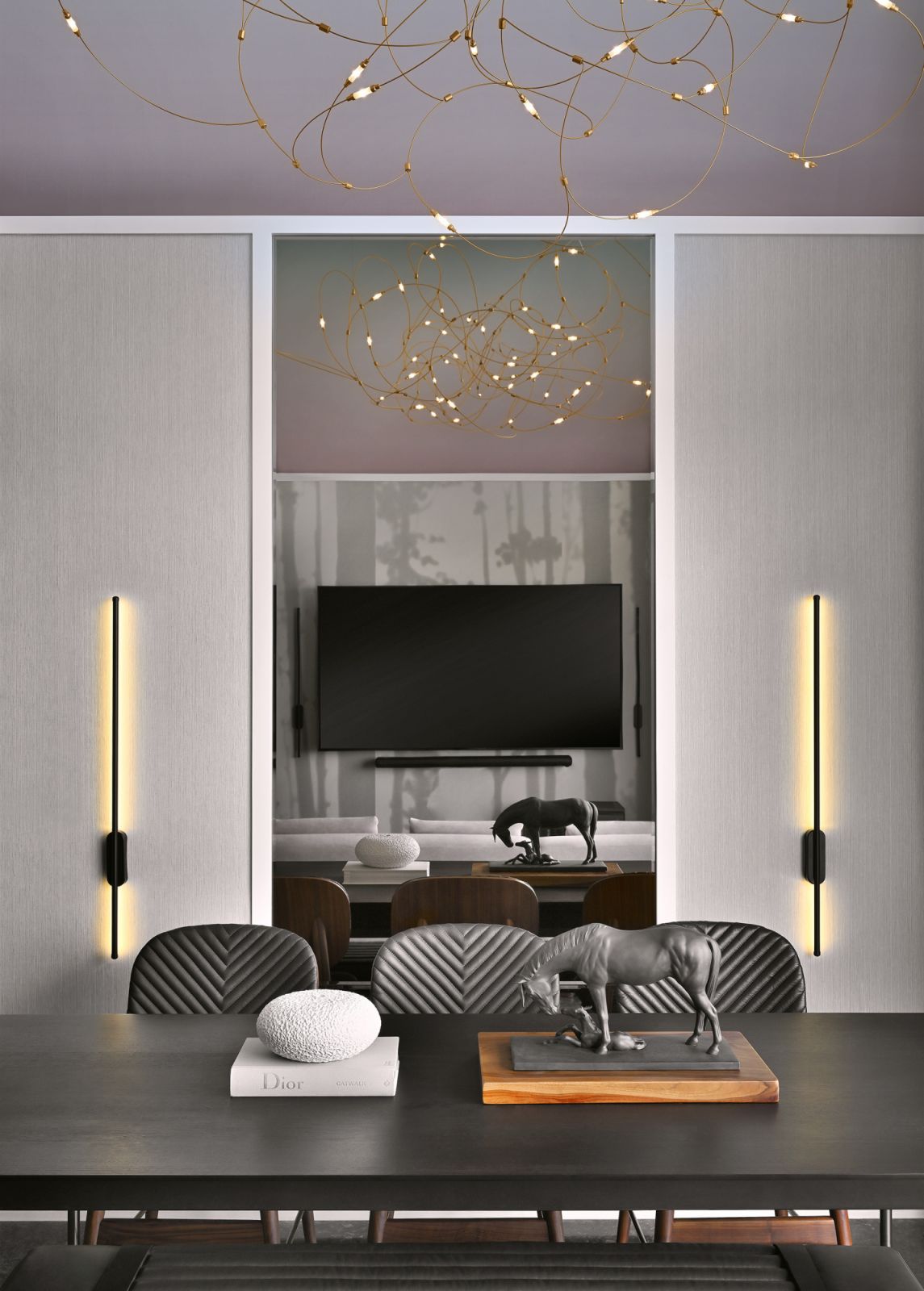 The four-bedroom apartment features high ceilings and an open-plan layout, with living and dining areas inspired by Sentosa’s golden sunsets