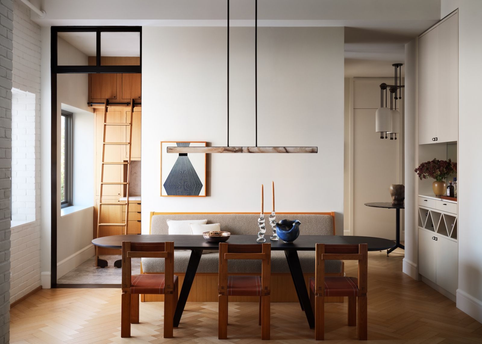 The dining room of a restored warehouse in the West Village, Manhattan, New York, designed by Grisoro Studio