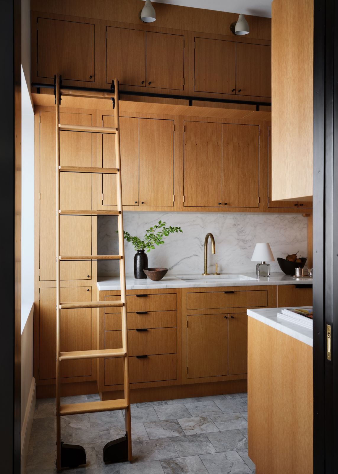 The kitchen of a restored warehouse in the West Village, Manhattan, New York designed by Grisoro Studio