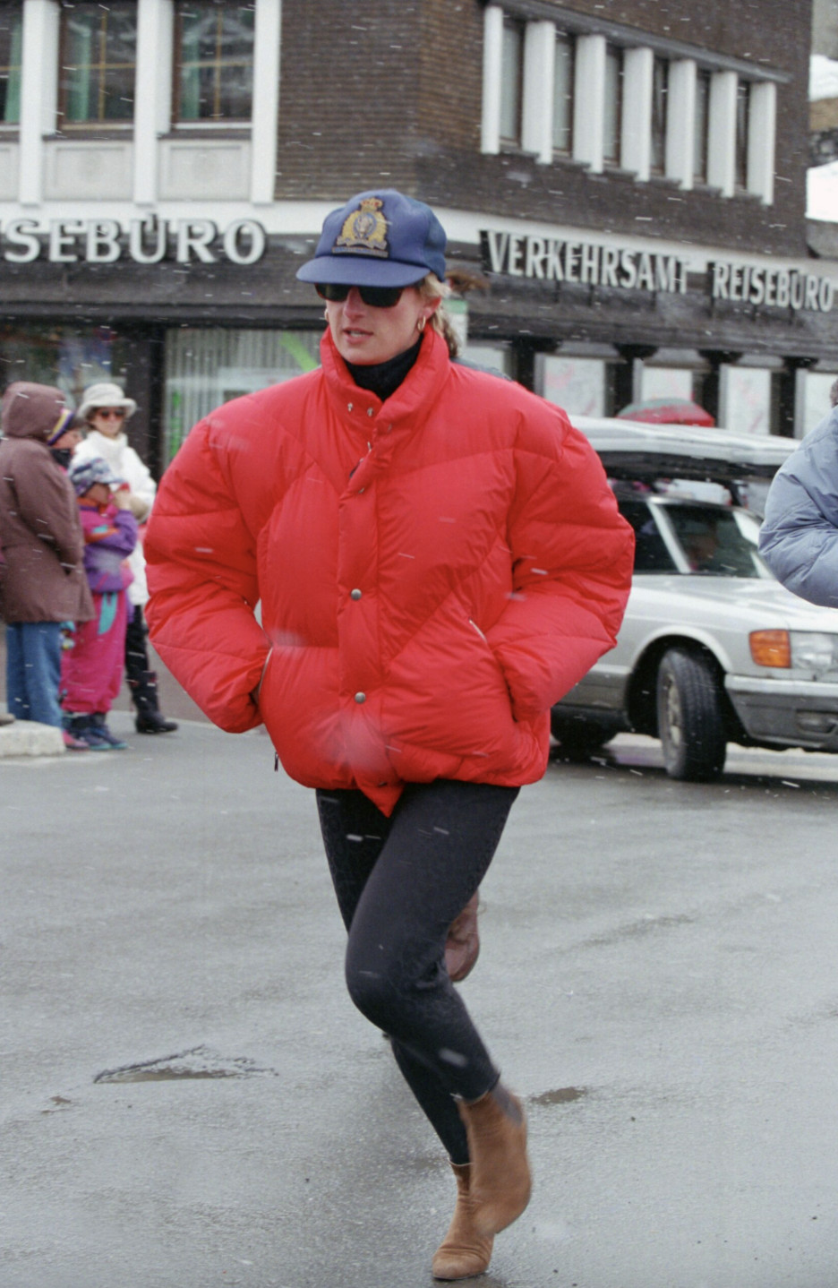 Diana, Princess of Wales wears a red puffer coat while on a ski holiday in Switzerland (Photo: Getty Images)
