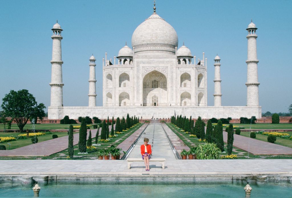 INDIA - FEBRUARY 11: Diana Princess of Wales sits in front of the Taj Mahal during a visit to India (Photo by Tim Graham Photo Library via Getty Images)