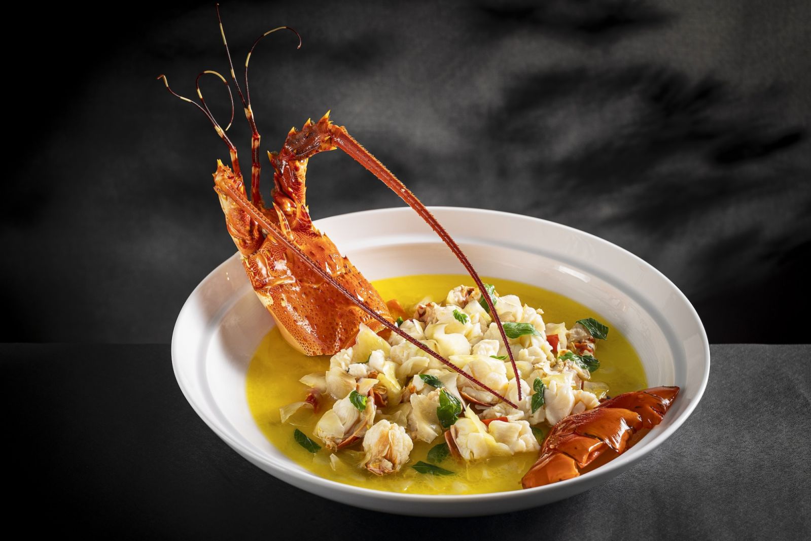 Wok-fried lobster with basil and pickled mustard greens (Photo: Mandarin Oriental, Singapore) cherry garden by chef fei