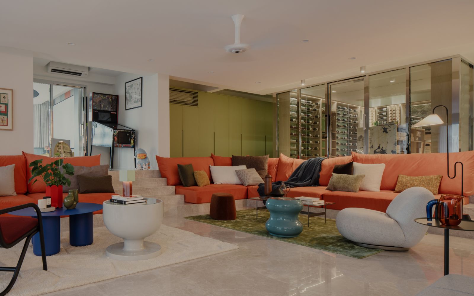 The clever placement of the sunken living room’s sofas lends it an amphitheatre-like feel