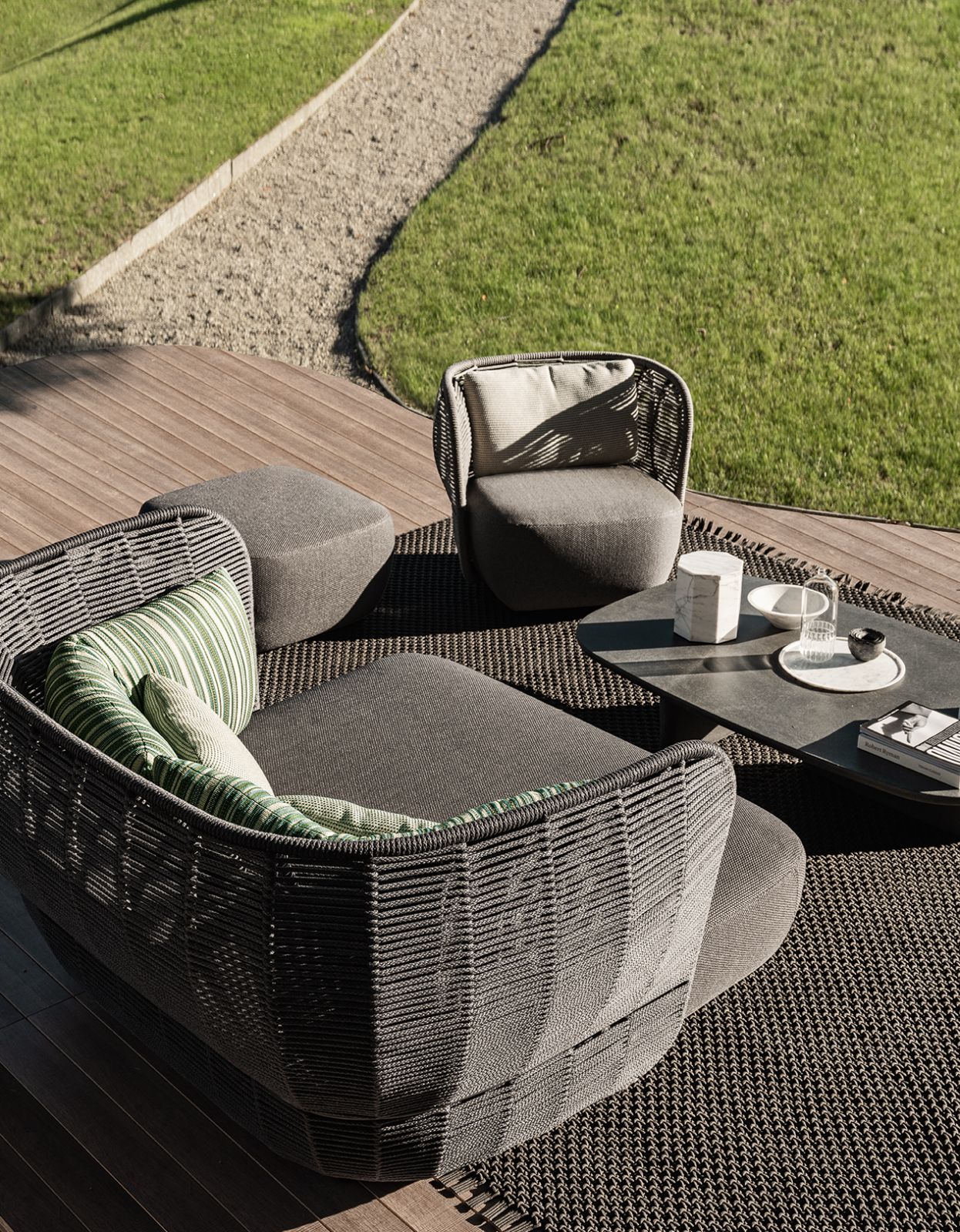 Inspired by Japanese garden stones, Edward Barber and Jay Osgerby’s sculptural B&B Italia Tobi-Ishi coffee table captures the precarious balance of stacked rocks while exuding the Zen-like calmness that defines biophilic design
