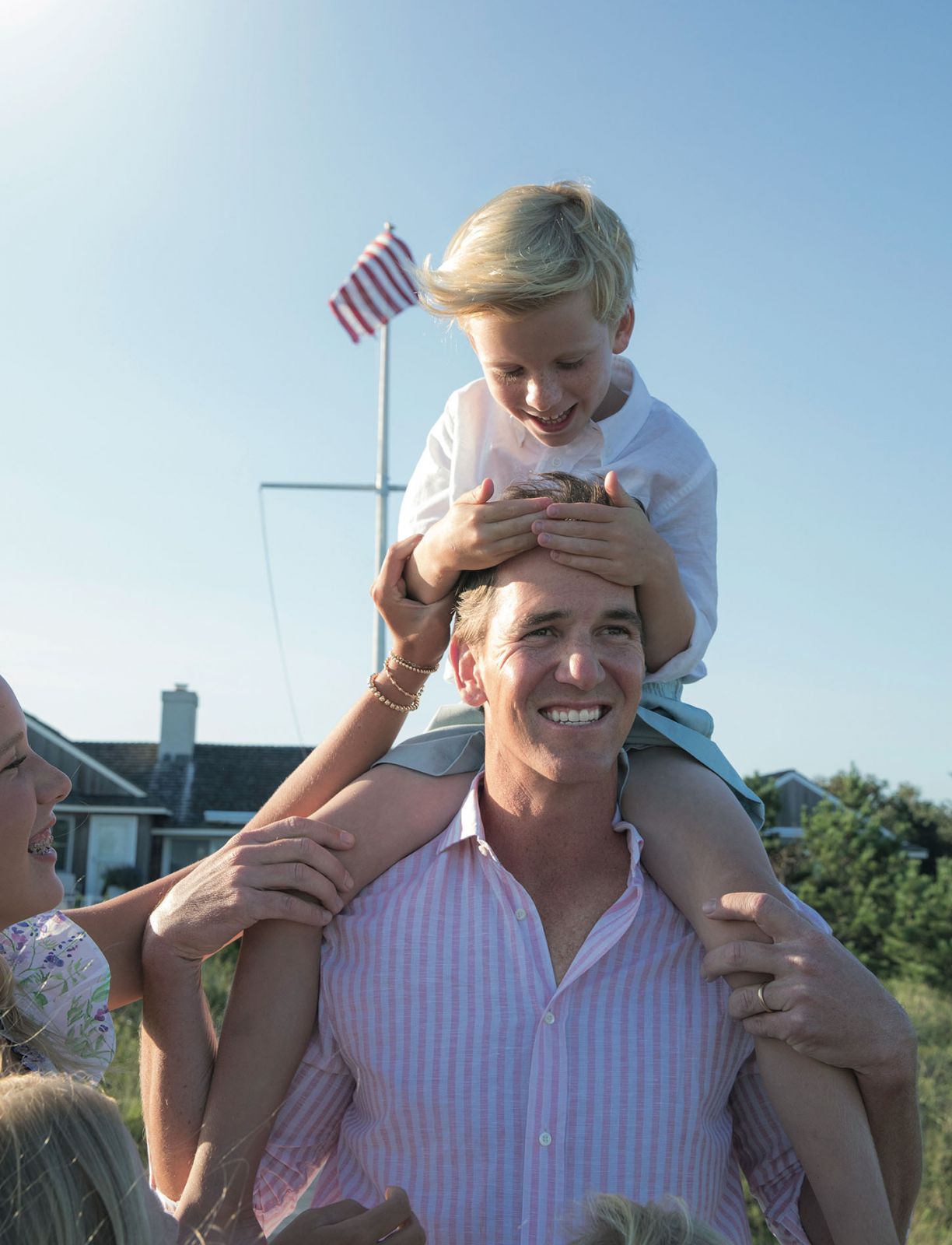 Eli Manning with his children at his beach house in Quogue, New York