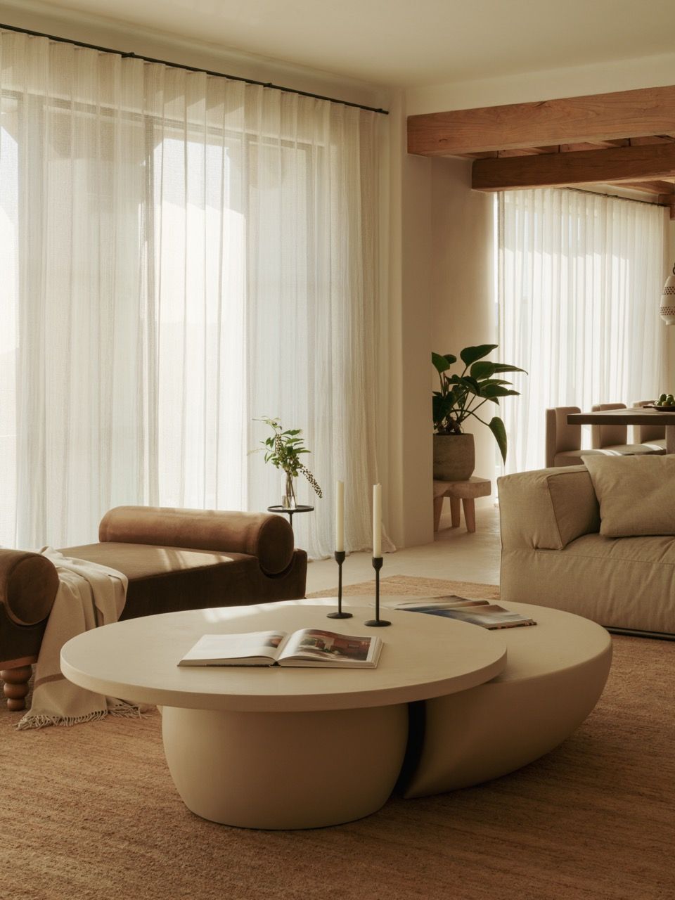 Tom Lawrence-Levy’s signature coffee table takes centre stage in the living area, designed as two interlocking pieces that demonstrate his philosophy of creating furniture that only works when the elements come together