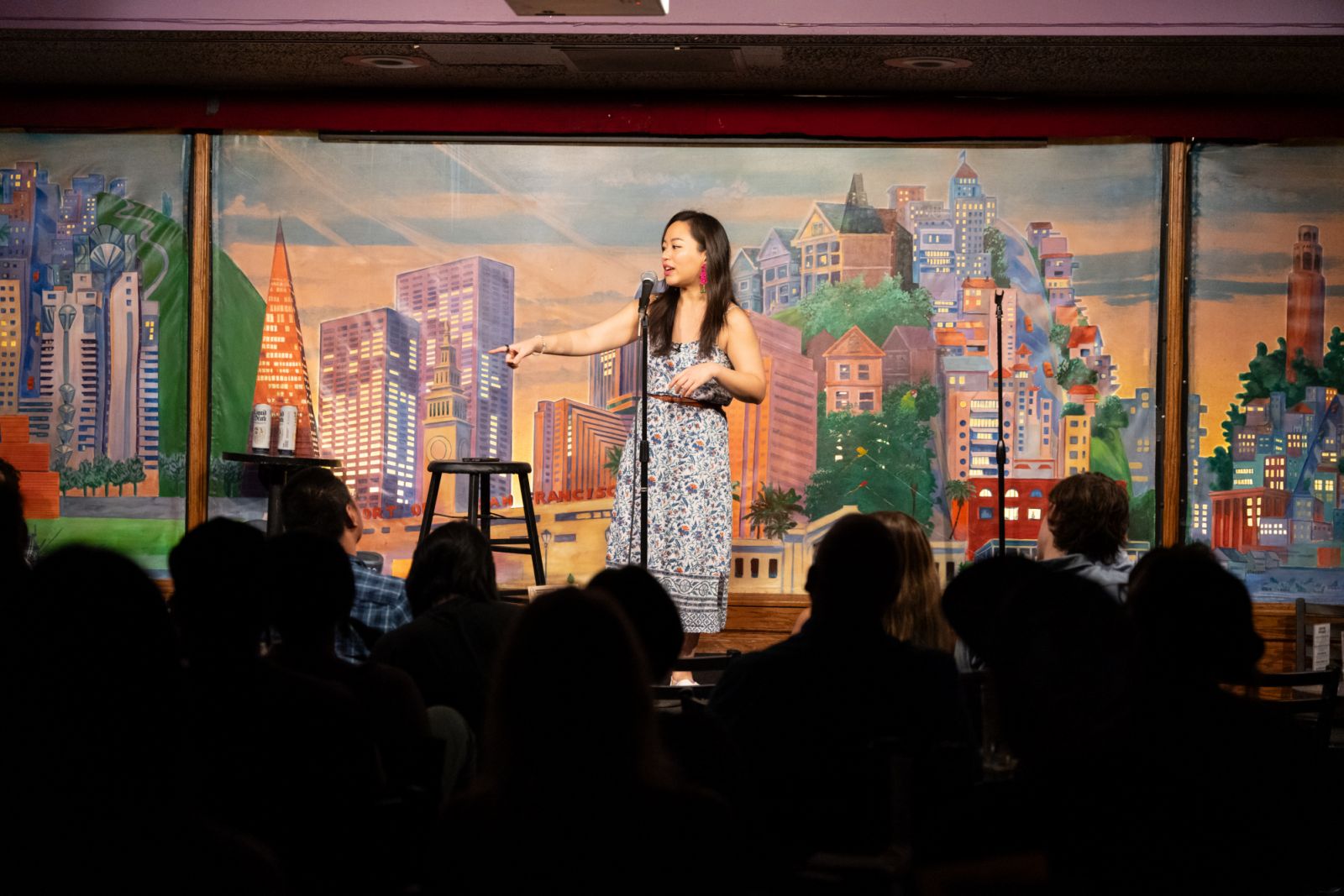 Tan performing at Punch Line