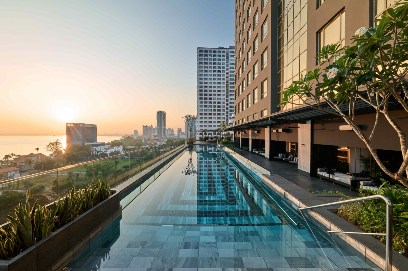 The sun-kissed pool terrace with views of the city skyline (Photo: The Millen)