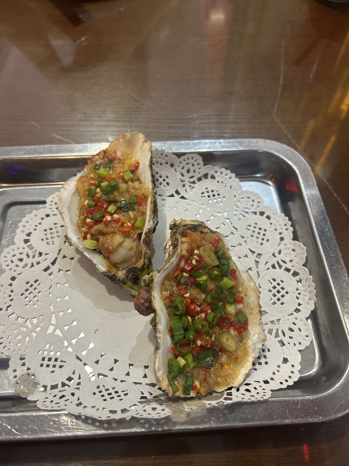 Oysters with garlic and chillies