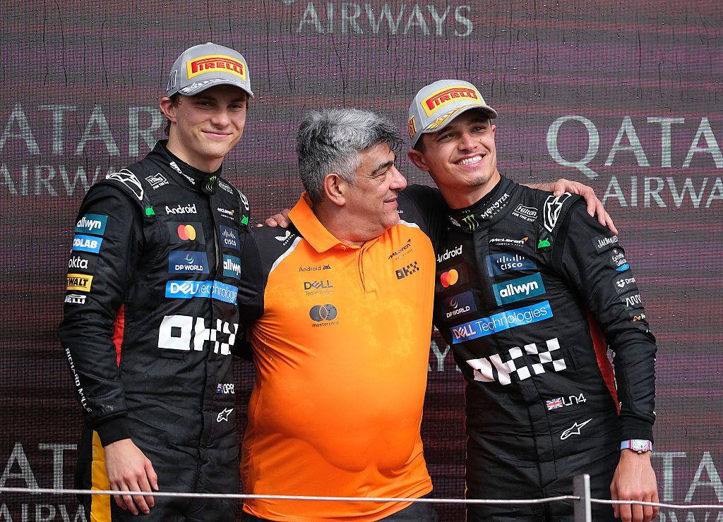 TOWCESTER, NORTHAMPTONSHIRE, UNITED KINGDOM - 2025/07/06: Lando Norris and Oscar Piastri of McLaren F1 Team and technical director Peter Prodromou seen on the podium after the Formula One British Grand Prix at Silverstone Lando Norris of McLaren F1 Team is the winner of the British Grand Prix. (Photo by Paul Bonser/SOPA Images/LightRocket via Getty Images)