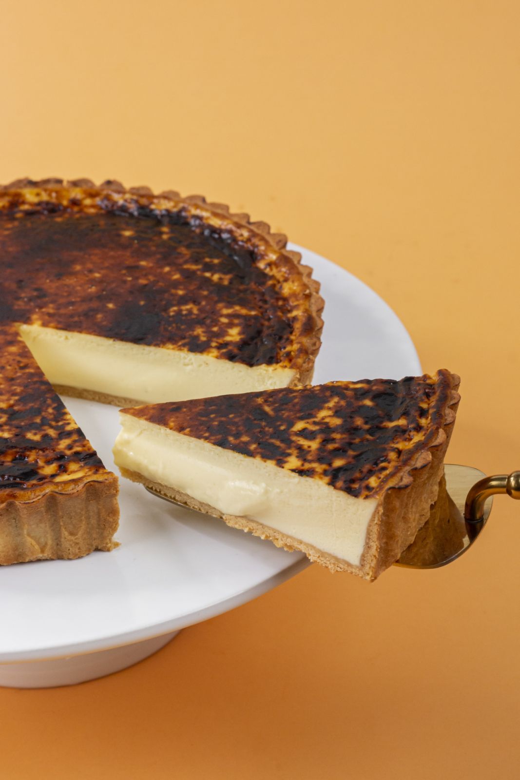 A slice of Olivia’s signature cheesecake (Photo: Queic by Olivia) best cheesecake singapore