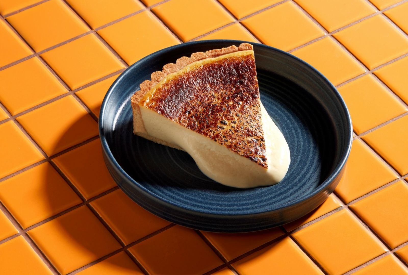 A slice of Olivia’s signature cheesecake (Photo: Queic by Olivia) best cheesecake singapore