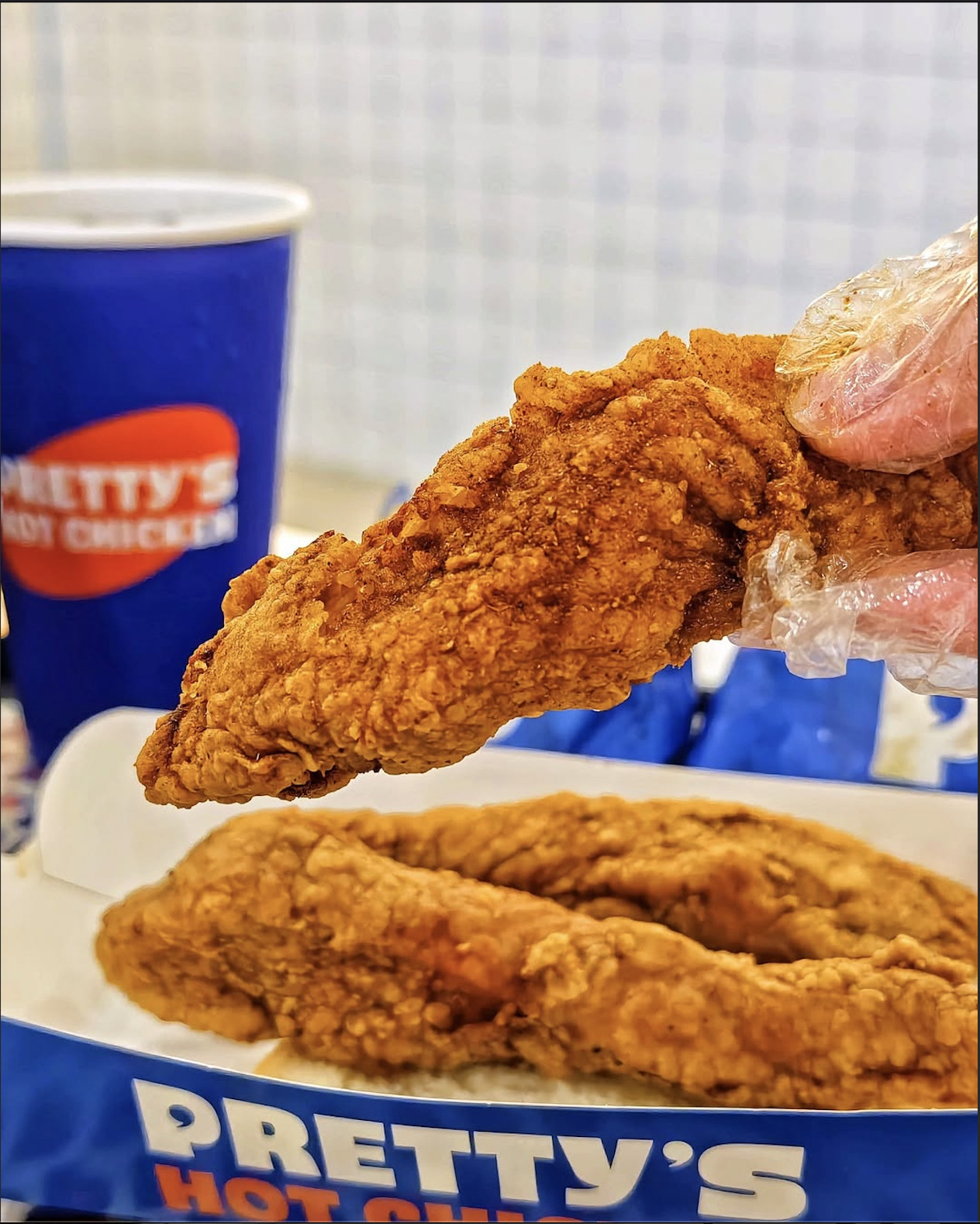 Crispy fried chicken tenders, dipped in their addictive Pretty Sauce—a spicy twist on thousand island that keeps you coming back (Photo: Instagram / @aya.yeaney)