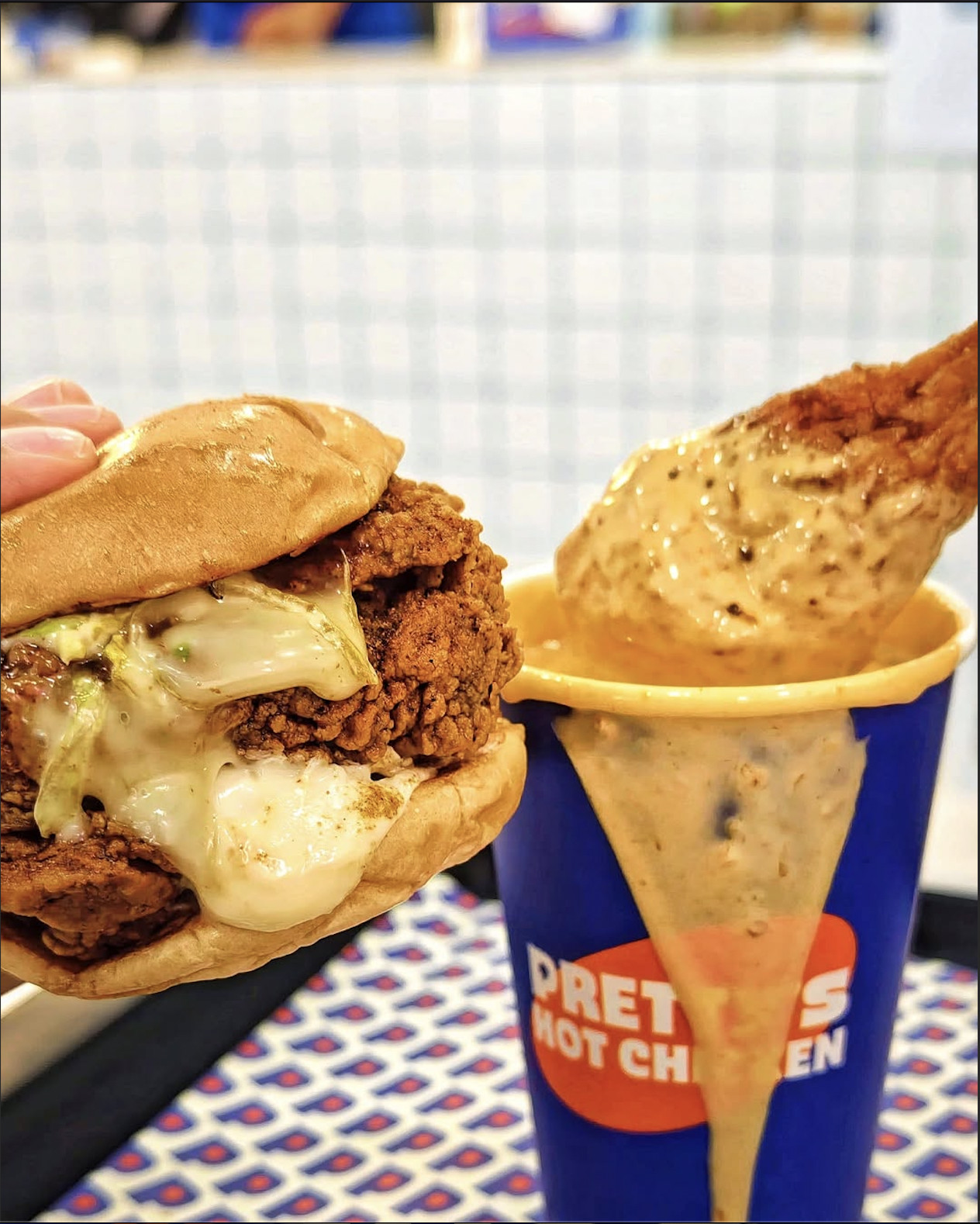 Nashville-style fried chicken fillet, tucked in a soft bun and stacked with flavour. Pretty’s Deluxe Burger is fried chicken, done right (Photo: Instagram / @aya.yeaney)