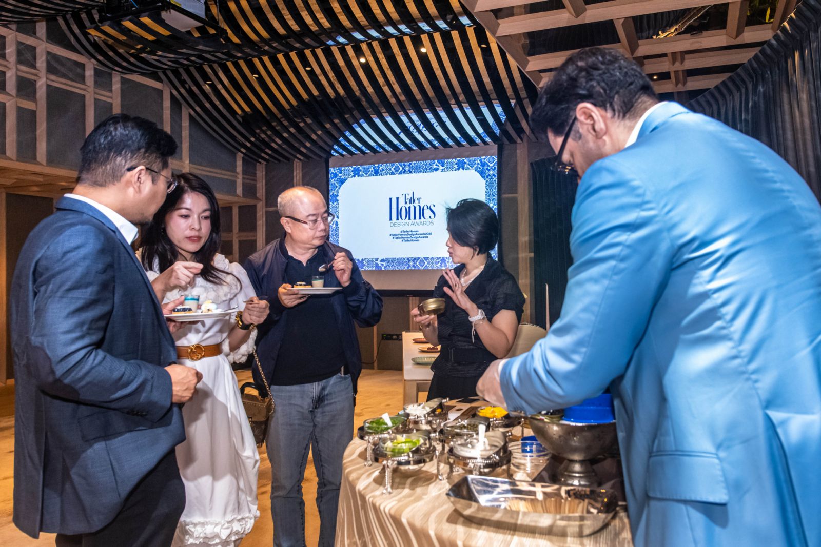 Guests enjoying the caviar bar, courtesy of Belugari Caviar