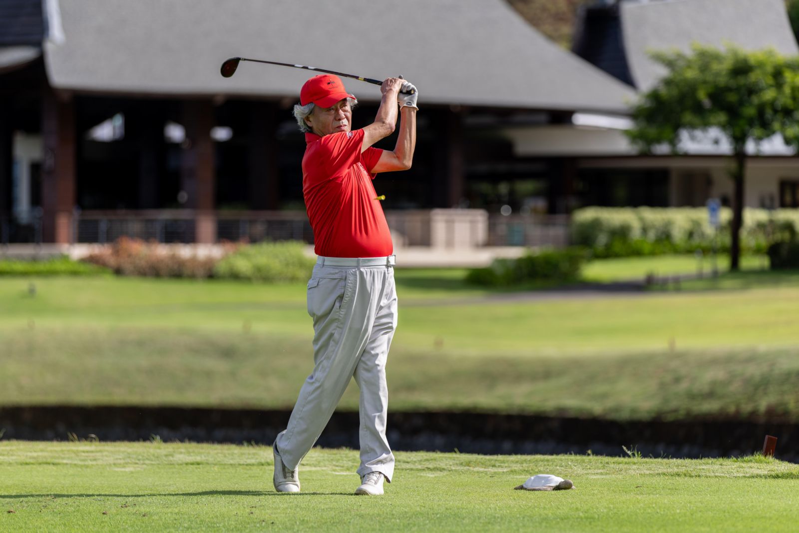 Chairman Kim Jung Tae from Top 100 Golf Courses Asia playing golf at Hole 1, Anvaya Cove Golf and Sports Club