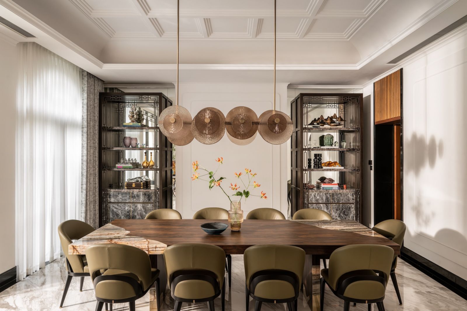 The dining room in a Hong Kong multigenerational home designed by Liquid Interiors
