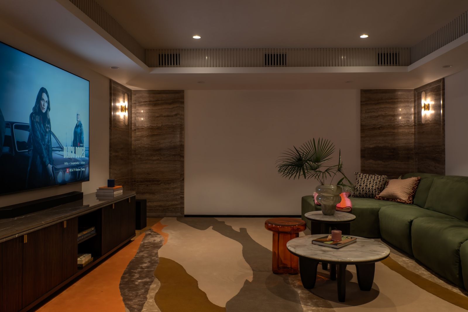 The cinema room in a Hong Kong multigenerational home designed by Liquid Interiors