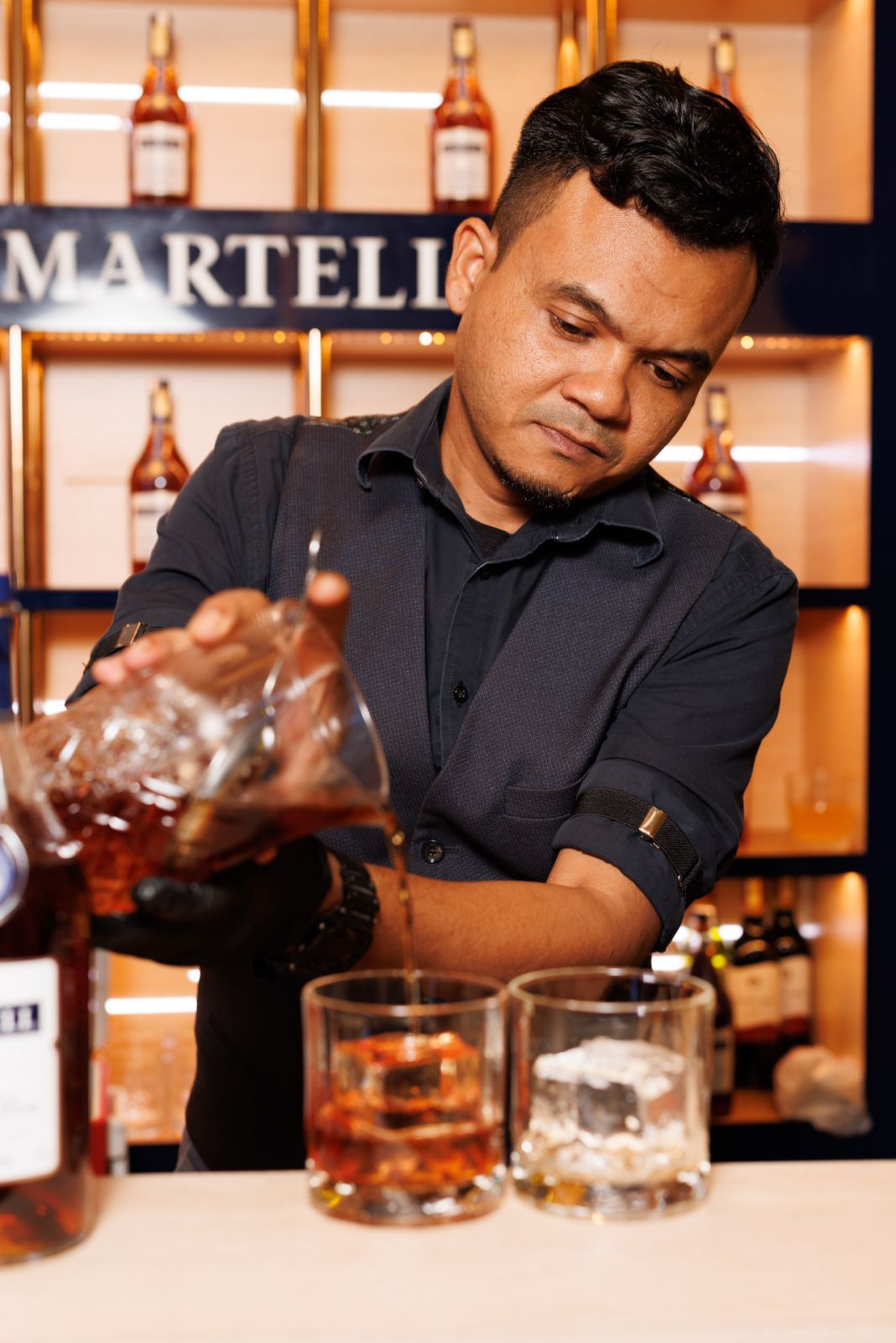 Serving Martell cognac