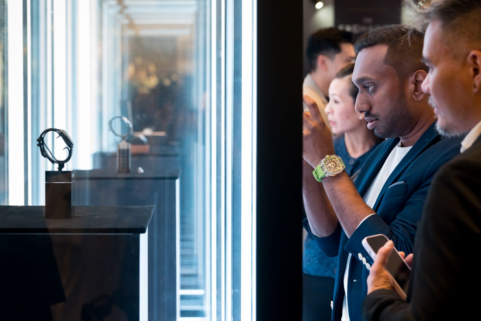 Guests viewing the watches on display