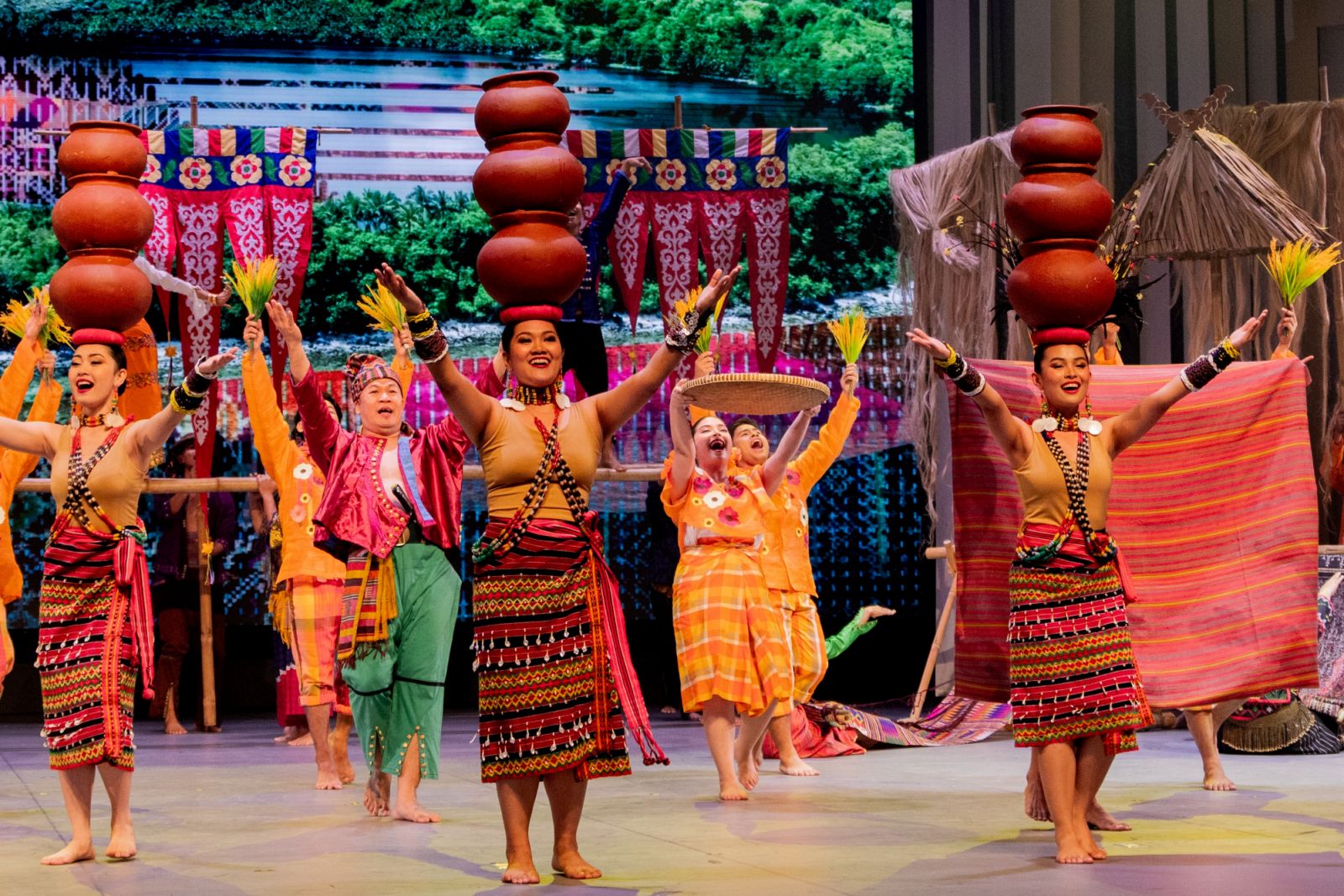 Costumed performers struck a dynamic pose mid-performance, where they gesture a welcoming energy that invited audiences to take part in the rich cultural tapestry of the Philippines (Photo: Tourism Promotions Board Philippines)