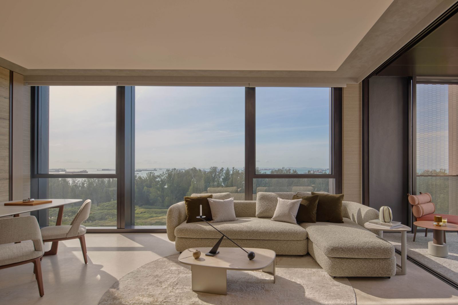 The chic common areas of this apartment on Singapore’s east coast are framed by expansive vistas of land and sea