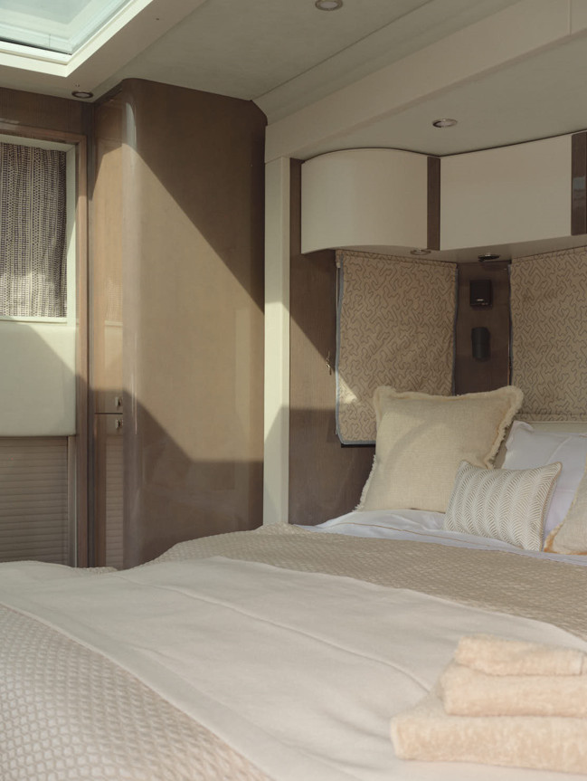 The sleeping quarters feature white Alcantara and Angora leather wall coverings, with strategic lighting that adapts the mood from dawn to dusk