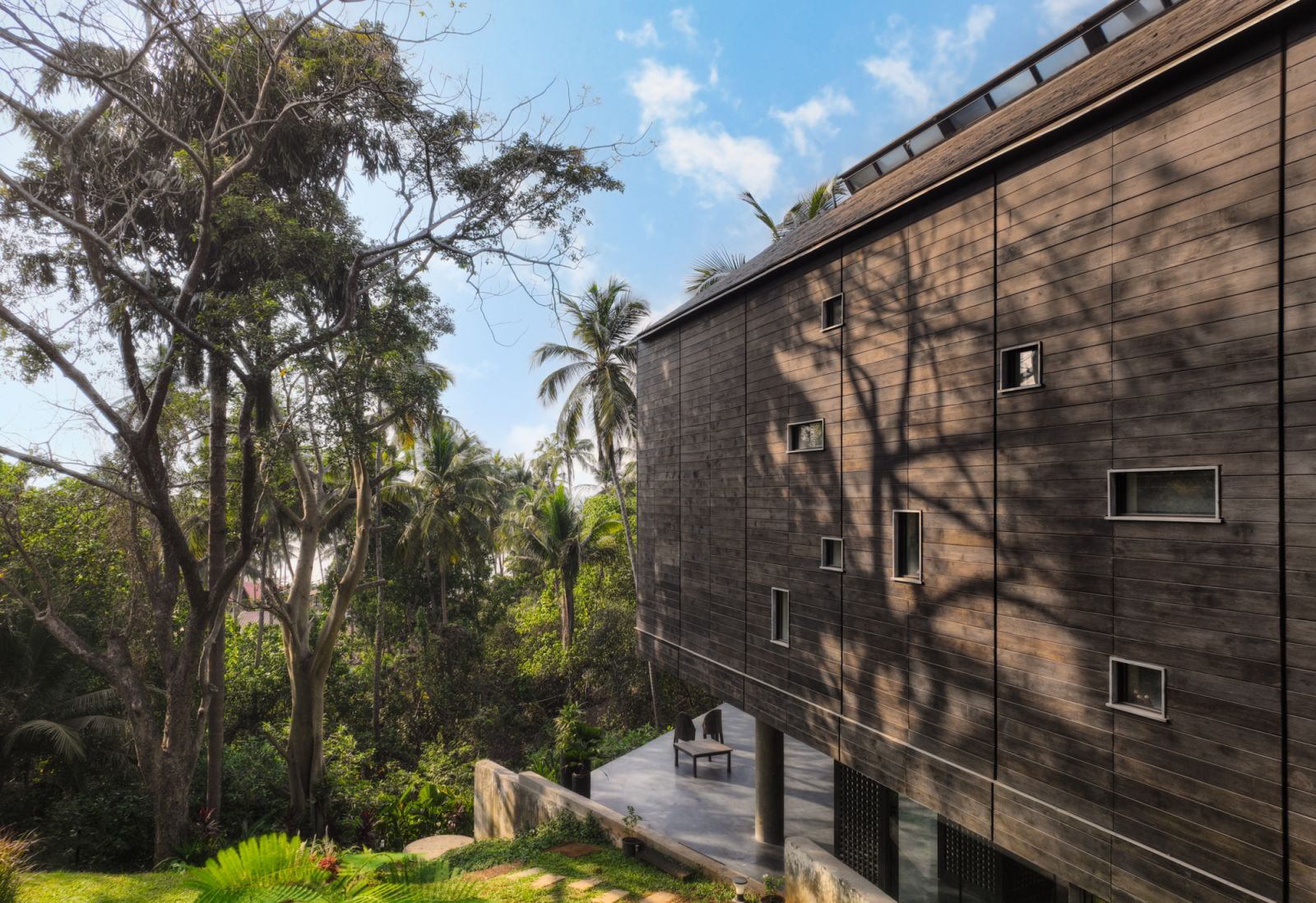 The façade consists of charred wood-panelled cladding using the traditional Japanese yakisugi technique