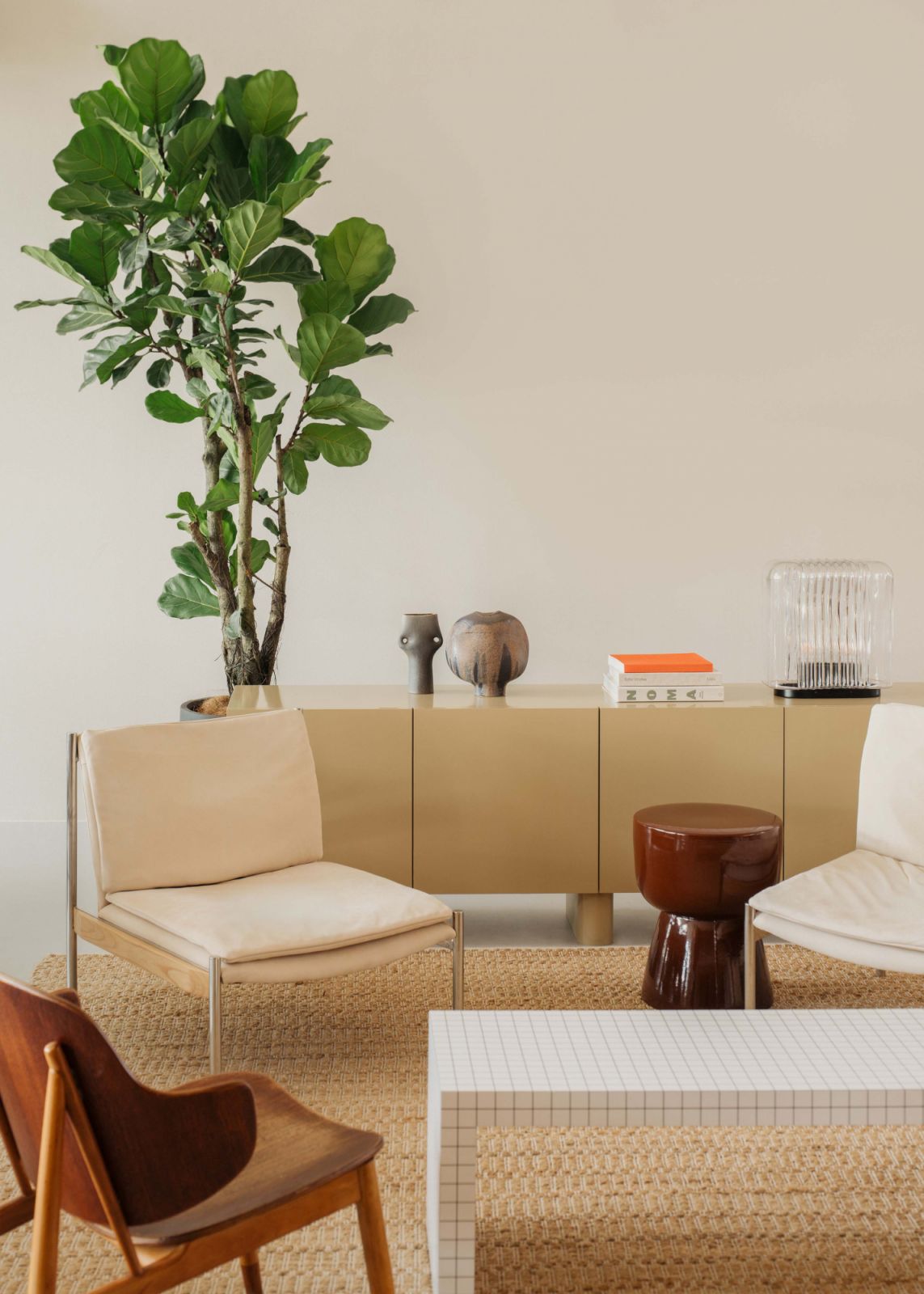 Neutral hue with brown accents adds a residential feel to the office setting