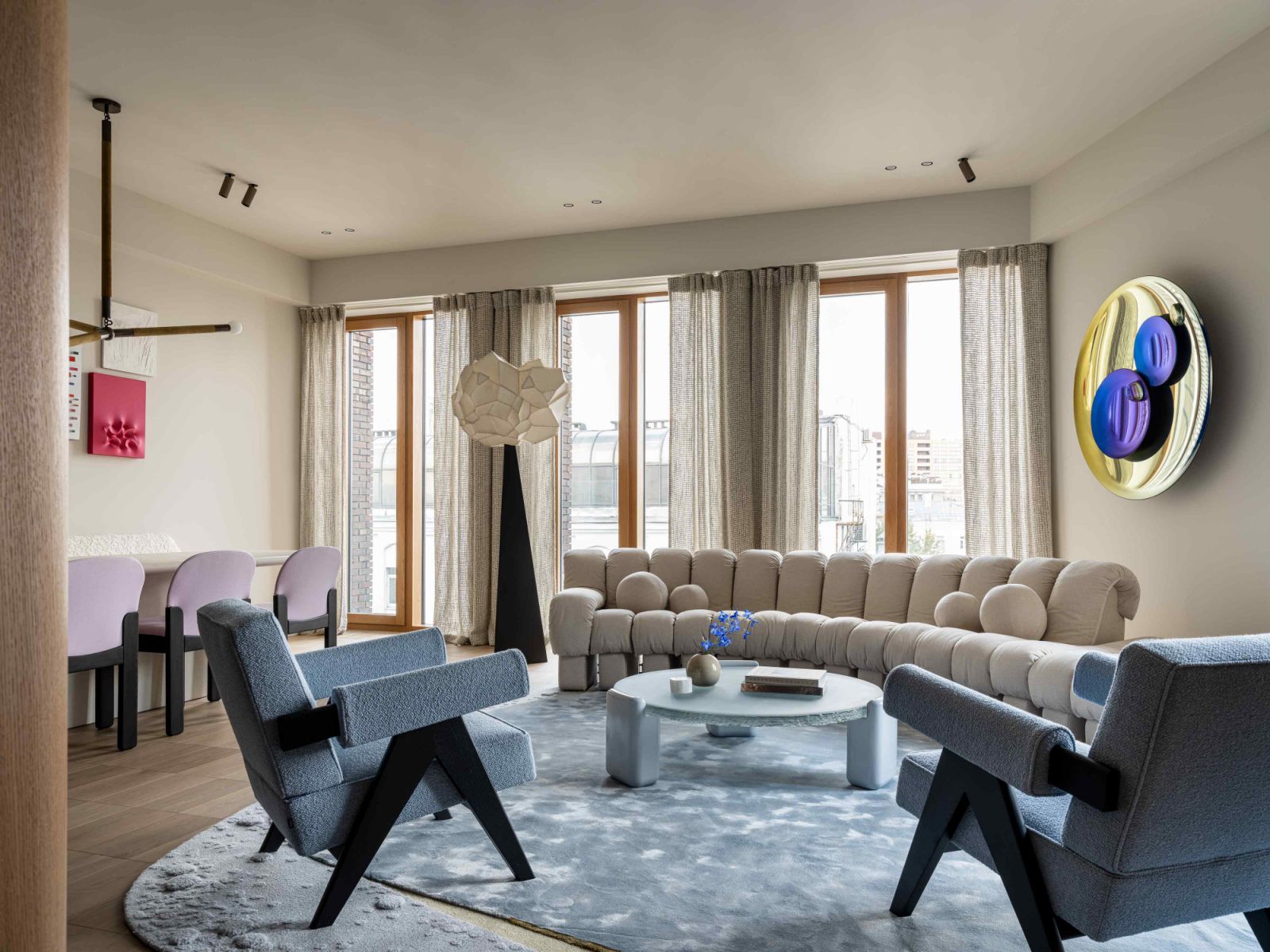 Pops of soothing colours in the neutral-toned living area