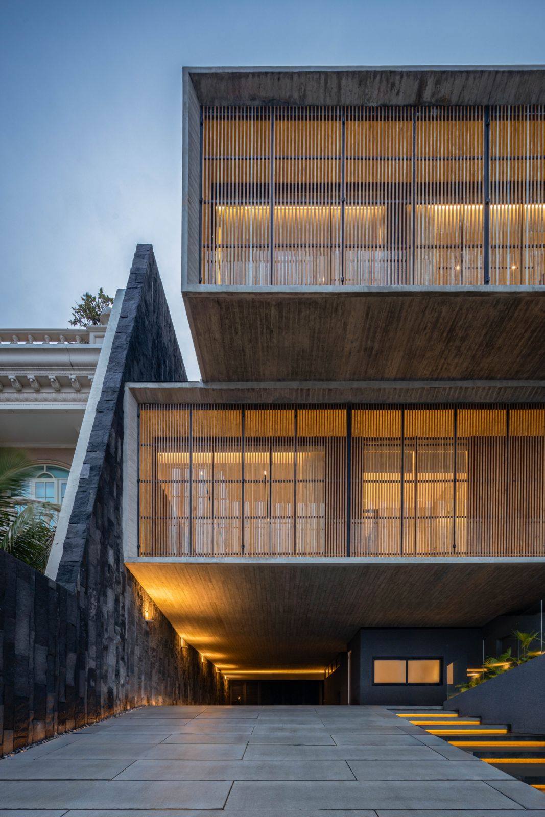 The timber panels help to mitigate the glare from the western sun and the noise